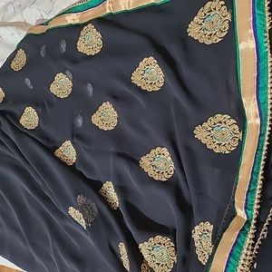 Black Gogeous party wear saree with blouse piece attached